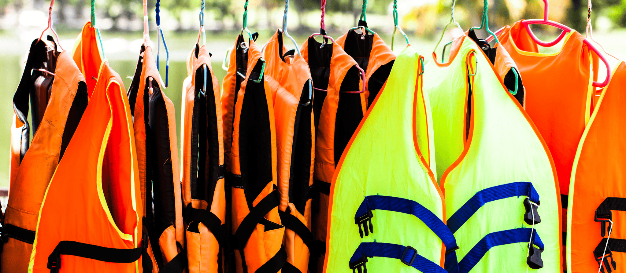 Buoyancy aids hanging on a rack Buoyancy aids hanging on a rack