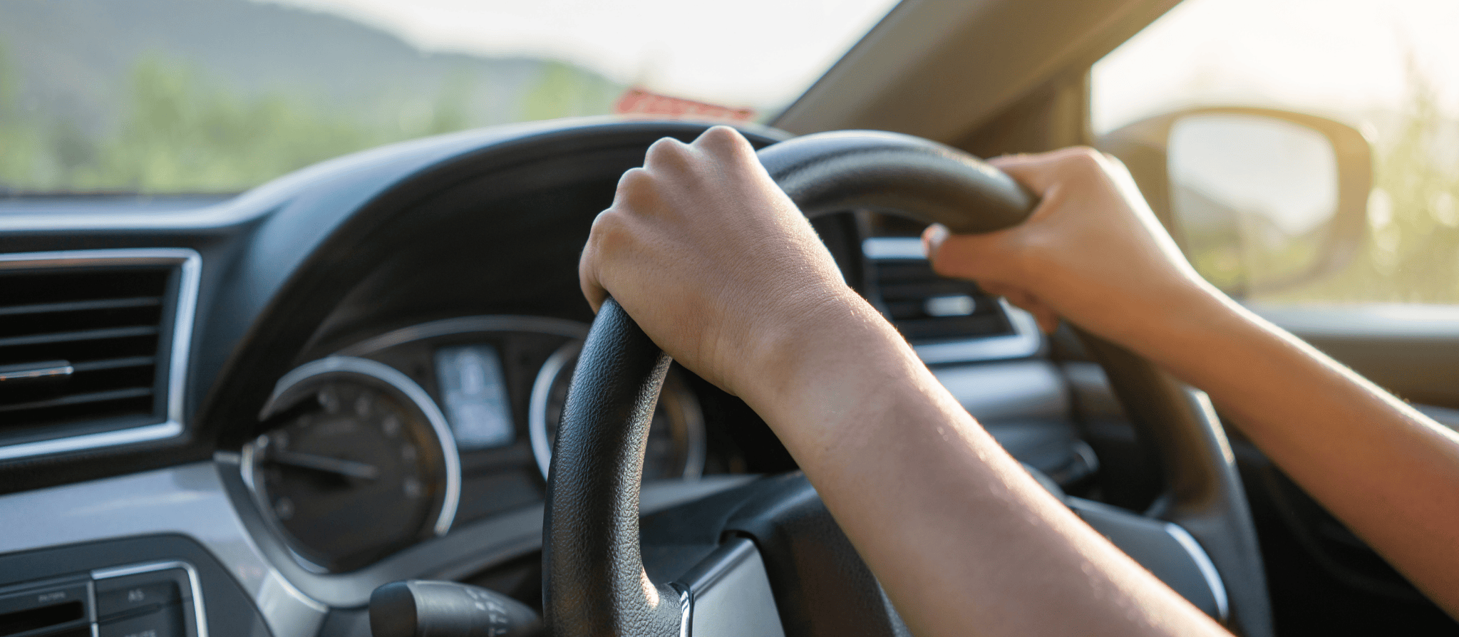 Driving a car hand on wheel Driving a car hand on wheel