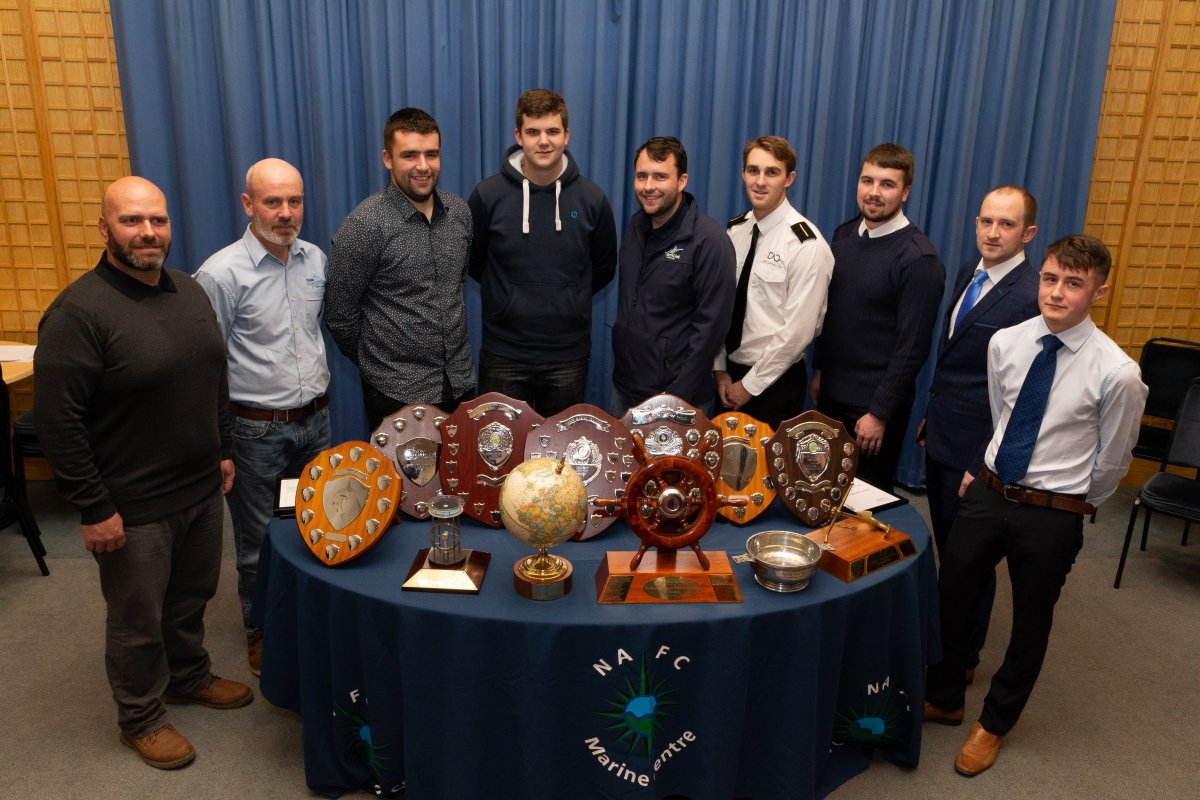 Prize winners with shields