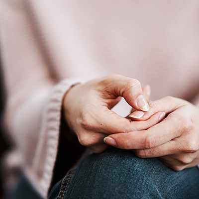 person rubbing their hands